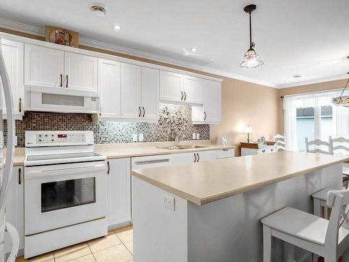 Kitchen - 404-225 Rue Bohémier, Mascouche, QC - Indoor Photo Showing Kitchen With Double Sink