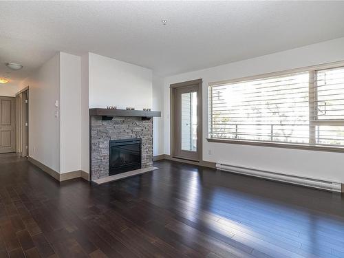 202-257 Moilliet St South, Parksville, BC - Indoor Photo Showing Living Room With Fireplace