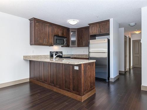 202-257 Moilliet St South, Parksville, BC - Indoor Photo Showing Kitchen