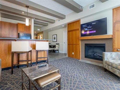 306/308 C-1376 Lynburne Pl, Langford, BC - Indoor Photo Showing Living Room With Fireplace