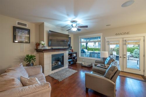 19-6823 Tucelnuit Drive, Oliver, BC - Indoor Photo Showing Living Room With Fireplace