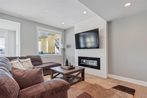 304 Silversage Bluff Lane, Vernon, BC - Indoor Photo Showing Living Room With Fireplace