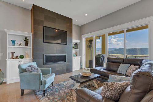 304 Silversage Bluff Lane, Vernon, BC - Indoor Photo Showing Living Room With Fireplace