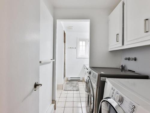 Salle de lavage - 114 Rue St-Joseph, Sainte-Thérèse, QC - Indoor Photo Showing Laundry Room