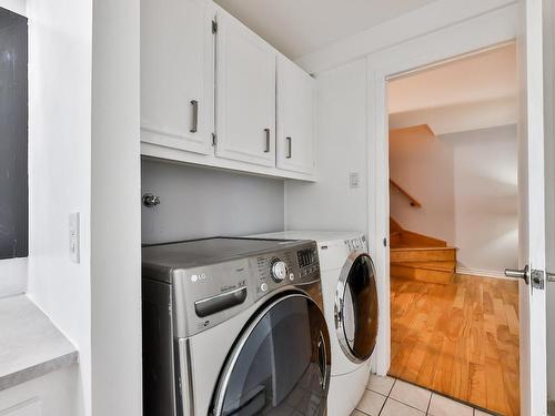 Salle de lavage - 114 Rue St-Joseph, Sainte-Thérèse, QC - Indoor Photo Showing Laundry Room