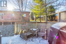 Snow covered deck featuring grilling area - 