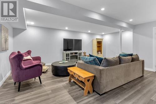 Living room with light hardwood / wood-style floors - 529 Nova Scotia Court Unit# 18, Woodstock, ON - Indoor