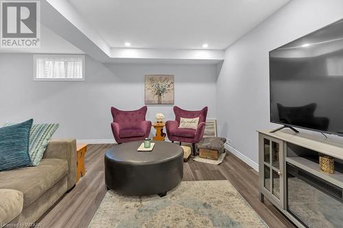 Living room with hardwood / wood-style floors - 529 Nova Scotia Court Unit# 18, Woodstock, ON - Indoor