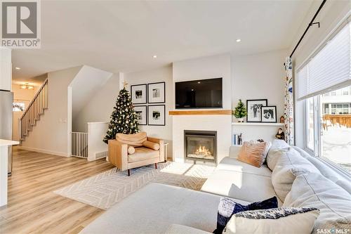 246 Stilling Union, Saskatoon, SK - Indoor Photo Showing Living Room With Fireplace