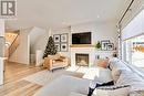 246 Stilling Union, Saskatoon, SK  - Indoor Photo Showing Living Room With Fireplace 