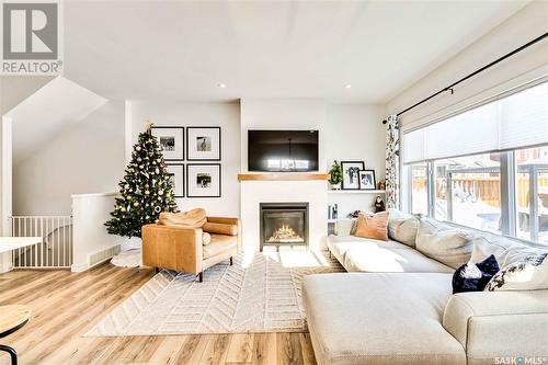 246 Stilling Union, Saskatoon, SK - Indoor Photo Showing Living Room With Fireplace