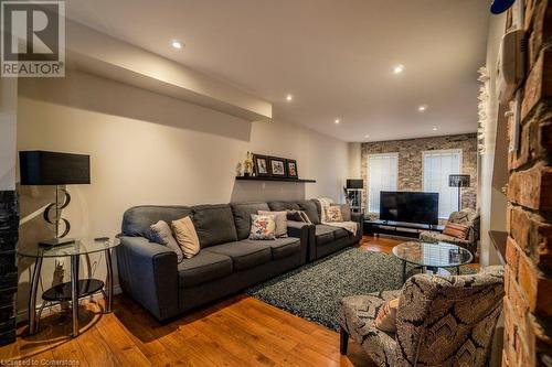 Living room with hardwood / wood-style flooring - 1480 Britannia Road W Unit# 143, Mississauga, ON - Indoor Photo Showing Living Room