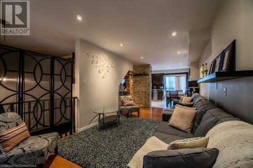 Living room with wood-type flooring - 1480 Britannia Road W Unit# 143, Mississauga, ON - Indoor