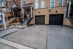 View of front of property with a garage - 