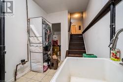 Bathroom with tile patterned flooring - 