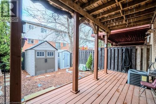 Wooden deck featuring a shed and central air condition unit - 1480 Britannia Road W Unit# 143, Mississauga, ON - Outdoor With Deck Patio Veranda With Exterior