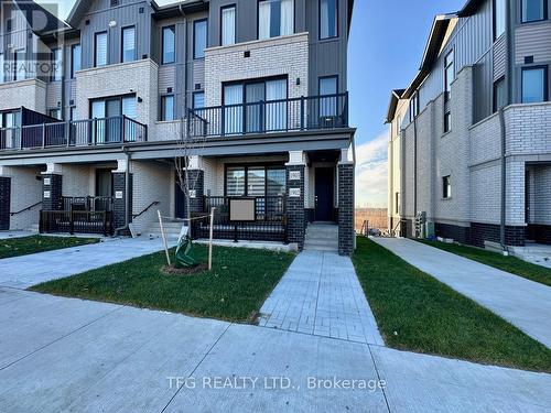 1902 - 160 Densmore Road, Cobourg, ON - Outdoor With Balcony With Facade