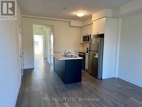 1902 - 160 Densmore Road, Cobourg, ON - Indoor Photo Showing Kitchen With Double Sink