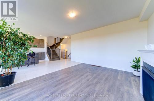 10 Shapira Avenue, Wasaga Beach, ON - Indoor Photo Showing Other Room With Fireplace