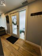 Doorway to outside with light hardwood / wood-style flooring - 