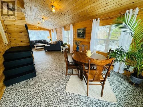 Dining room with vaulted ceiling, wood walls, and wood ceiling - 541 Donald Street, Mattawa, ON - Indoor Photo Showing Dining Room