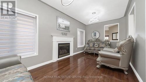 4 Chetholme Place, Halton Hills, ON - Indoor Photo Showing Living Room With Fireplace