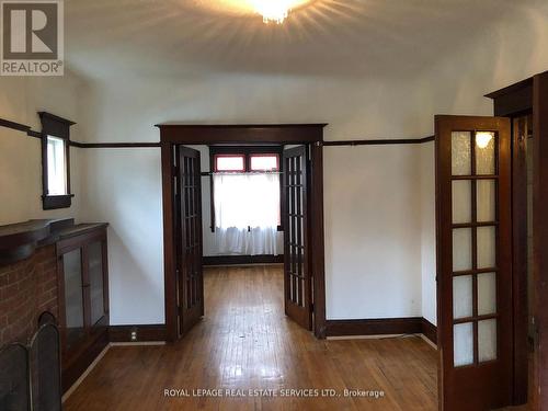 117 Clendenan Avenue, Toronto, ON - Indoor Photo Showing Other Room With Fireplace