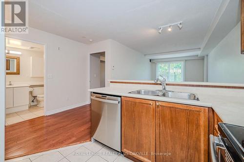 103 - 2300 Parkhaven Boulevard, Oakville, ON - Indoor Photo Showing Kitchen With Double Sink