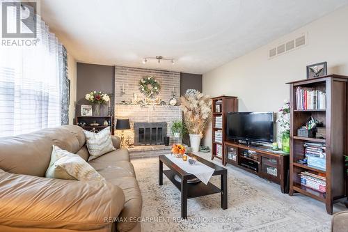 145 Homeside Avenue, Hamilton, ON - Indoor Photo Showing Living Room With Fireplace