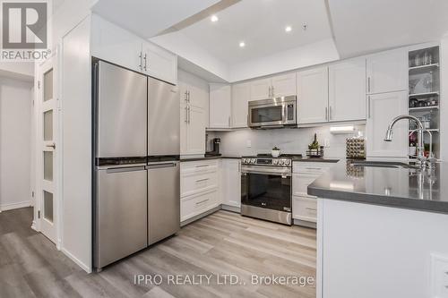 202 - 245 Scotland Street, Centre Wellington, ON - Indoor Photo Showing Kitchen With Upgraded Kitchen