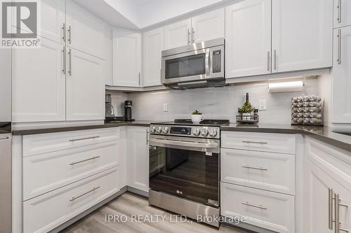 202 - 245 Scotland Street, Centre Wellington, ON - Indoor Photo Showing Kitchen With Upgraded Kitchen