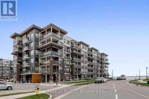 207 - 10 Esplanade Lane, Grimsby, ON - Outdoor With Facade