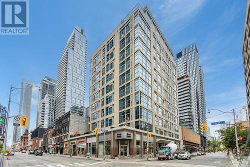 203 - 8 Wellesley Street E, Toronto, ON - Outdoor With Facade