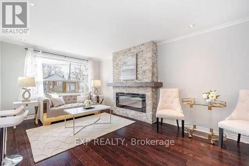 2774 St Clair Avenue E, Toronto, ON - Indoor Photo Showing Living Room With Fireplace