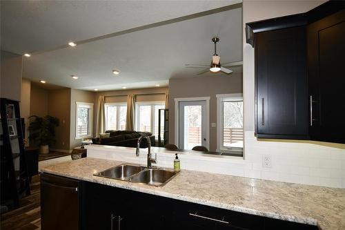 302 Clement Drive, Russell, MB - Indoor Photo Showing Kitchen With Double Sink