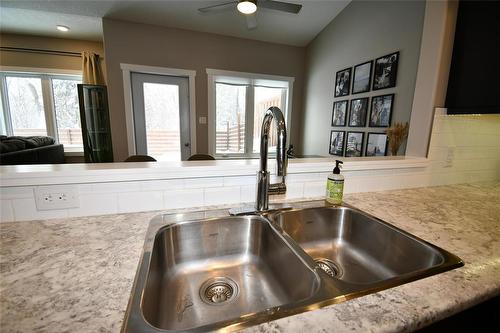 302 Clement Drive, Russell, MB - Indoor Photo Showing Kitchen With Double Sink