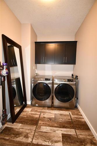 302 Clement Drive, Russell, MB - Indoor Photo Showing Laundry Room