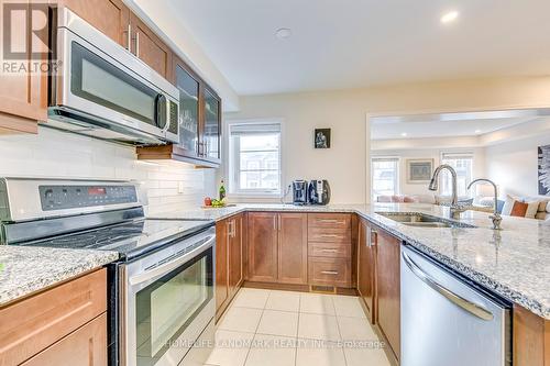 3075 Harebell Gate, Oakville, ON - Indoor Photo Showing Kitchen With Double Sink