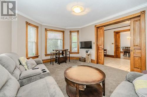 Carpeted living room with ornamental molding - 3212 Roseville Road, Roseville, ON - Indoor Photo Showing Living Room