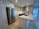 212N 22226 Brown Avenue, Maple Ridge, BC  - Indoor Photo Showing Kitchen With Double Sink With Upgraded Kitchen 