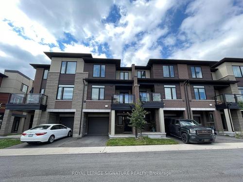 99-590 North Service Rd E, Hamilton, ON - Outdoor With Balcony With Facade