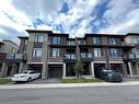 99-590 North Service Rd E, Hamilton, ON  - Outdoor With Balcony With Facade 