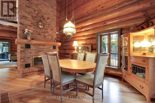 1 Lucas Lane, Ottawa, ON - Indoor Photo Showing Dining Room With Fireplace