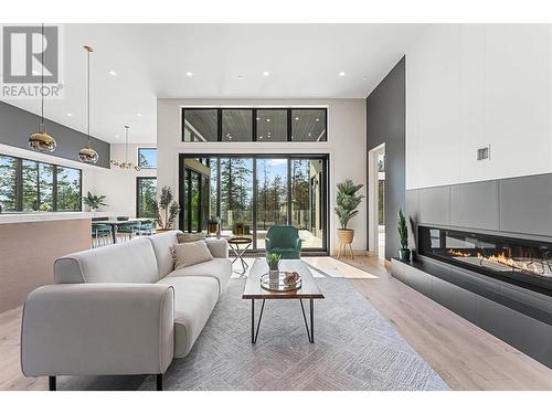 10218 Beacon Hill Drive, Lake Country, BC - Indoor Photo Showing Living Room With Fireplace