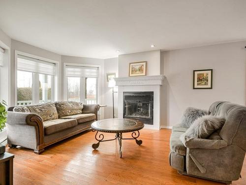 Salon - 5 Rue Du Boisé, Lachute, QC - Indoor Photo Showing Living Room With Fireplace