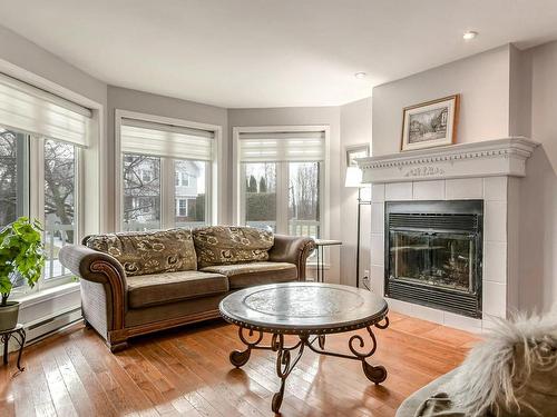 Salon - 5 Rue Du Boisé, Lachute, QC - Indoor Photo Showing Living Room With Fireplace