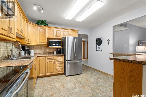 208 2305 Adelaide Street E, Saskatoon, SK - Indoor Photo Showing Kitchen With Double Sink