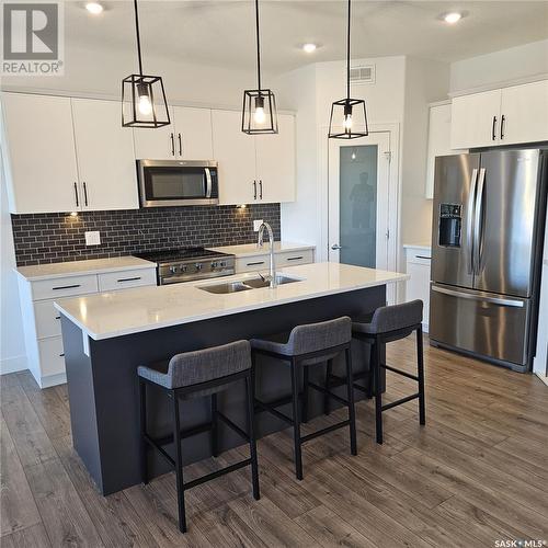 31 310 Evergreen Boulevard, Saskatoon, SK - Indoor Photo Showing Kitchen With Double Sink With Upgraded Kitchen