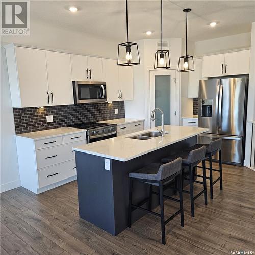 31 310 Evergreen Boulevard, Saskatoon, SK - Indoor Photo Showing Kitchen With Double Sink With Upgraded Kitchen