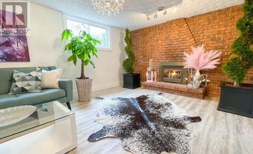 179 Orchard Drive, Hamilton, ON - Indoor Photo Showing Living Room With Fireplace